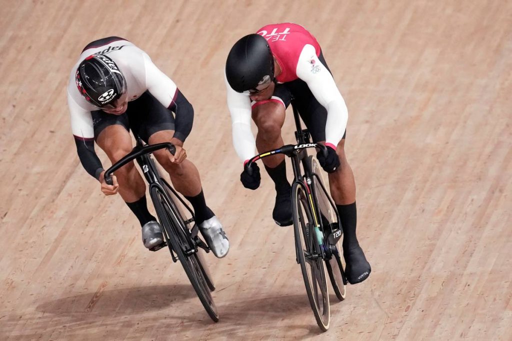In this Aug 5, 2021 file photo, Nicholas Paul of Trinidad and Tobago, right, and Yuta Wakimoto of Japan compete during the track cycling men's omnium scratch race at the 2020 Summer Olympics, in Izu, Japan. (AP Photo)