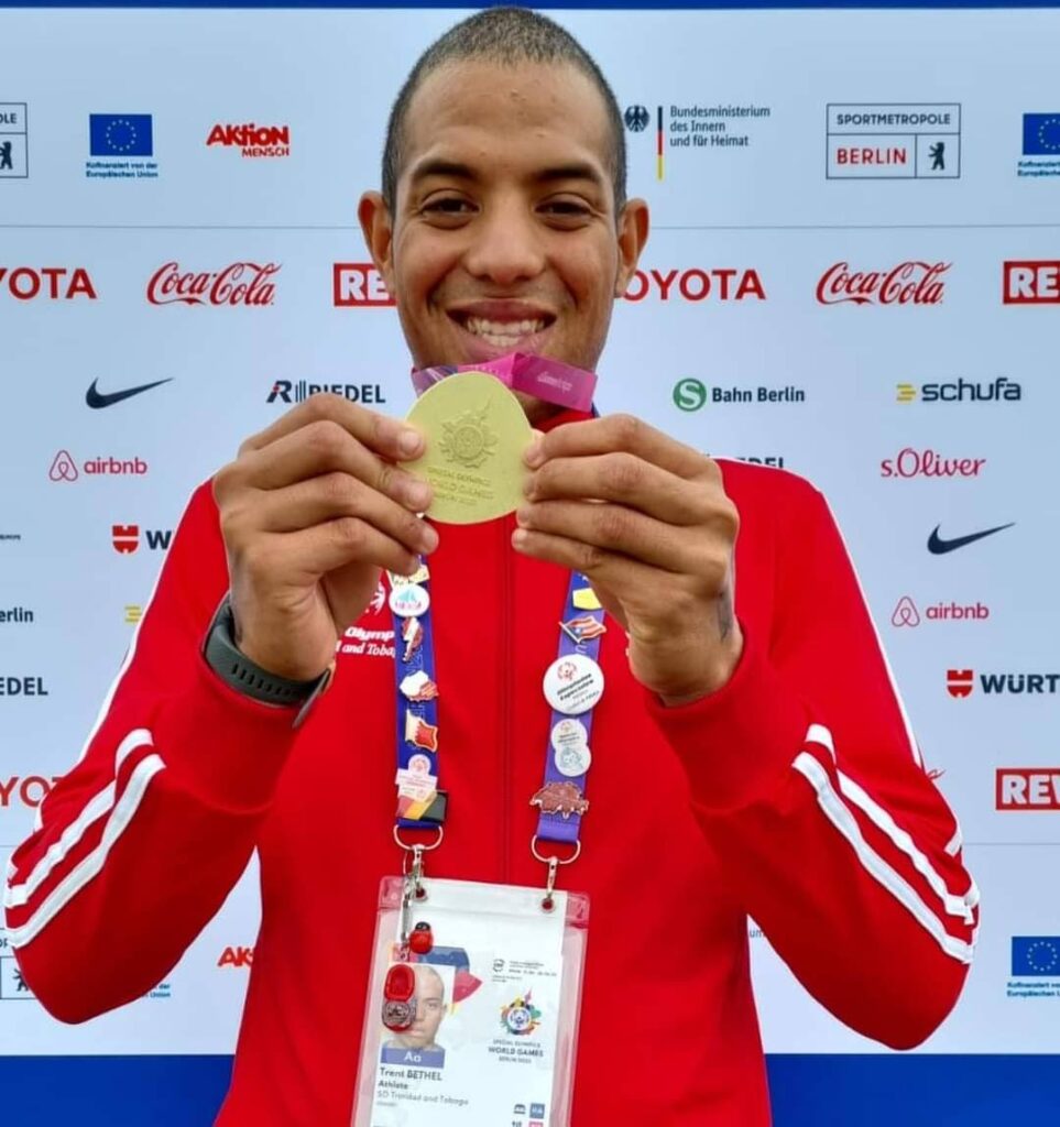 Trent Bethel shows off his Special Olympics World Games gold medal in Berlin, Germany. - (Image obtained at newsday.co.tt)