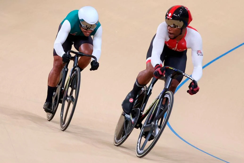 SPRINT KING: TTO sprinter Nicholas Paul, right, keeps an eye on Suriname’s Jair Tjon En Fa during the first ride of their men’s sprint final at the Velódromo at the Parque de Peñalolén, last October. Paul easily won in straight rides to secure TTO’s first gold medal at the Santiago 2023 Pan American Games to retain his title in the event. --Photo courtesy: Photosport/Panam Sports (Image obtained at trinidadexpress.com)